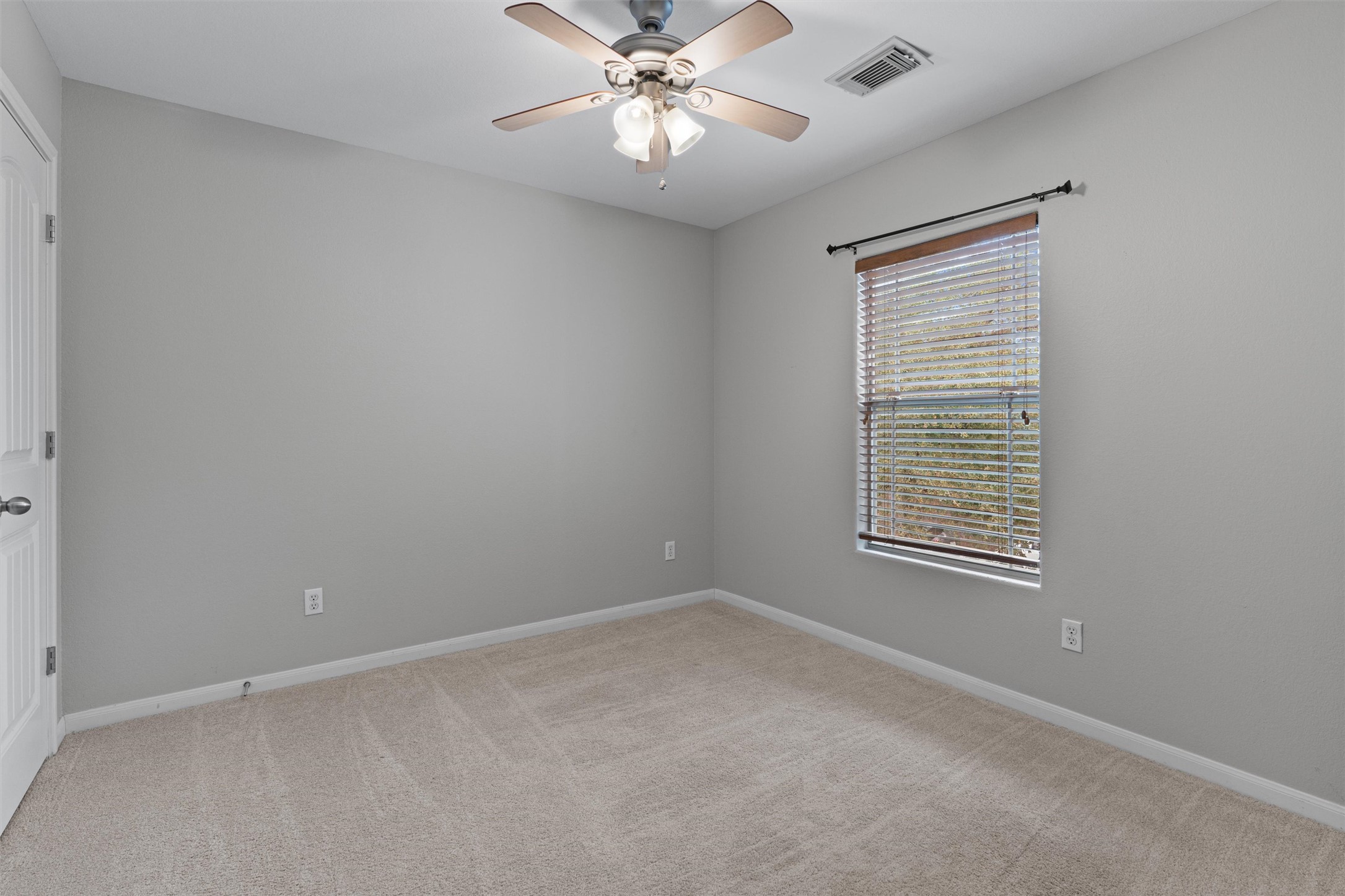 2240 Independence Drive, Unit A83 Austin, TX 78745 - Photo 25 of 34 a view of an empty room with a window