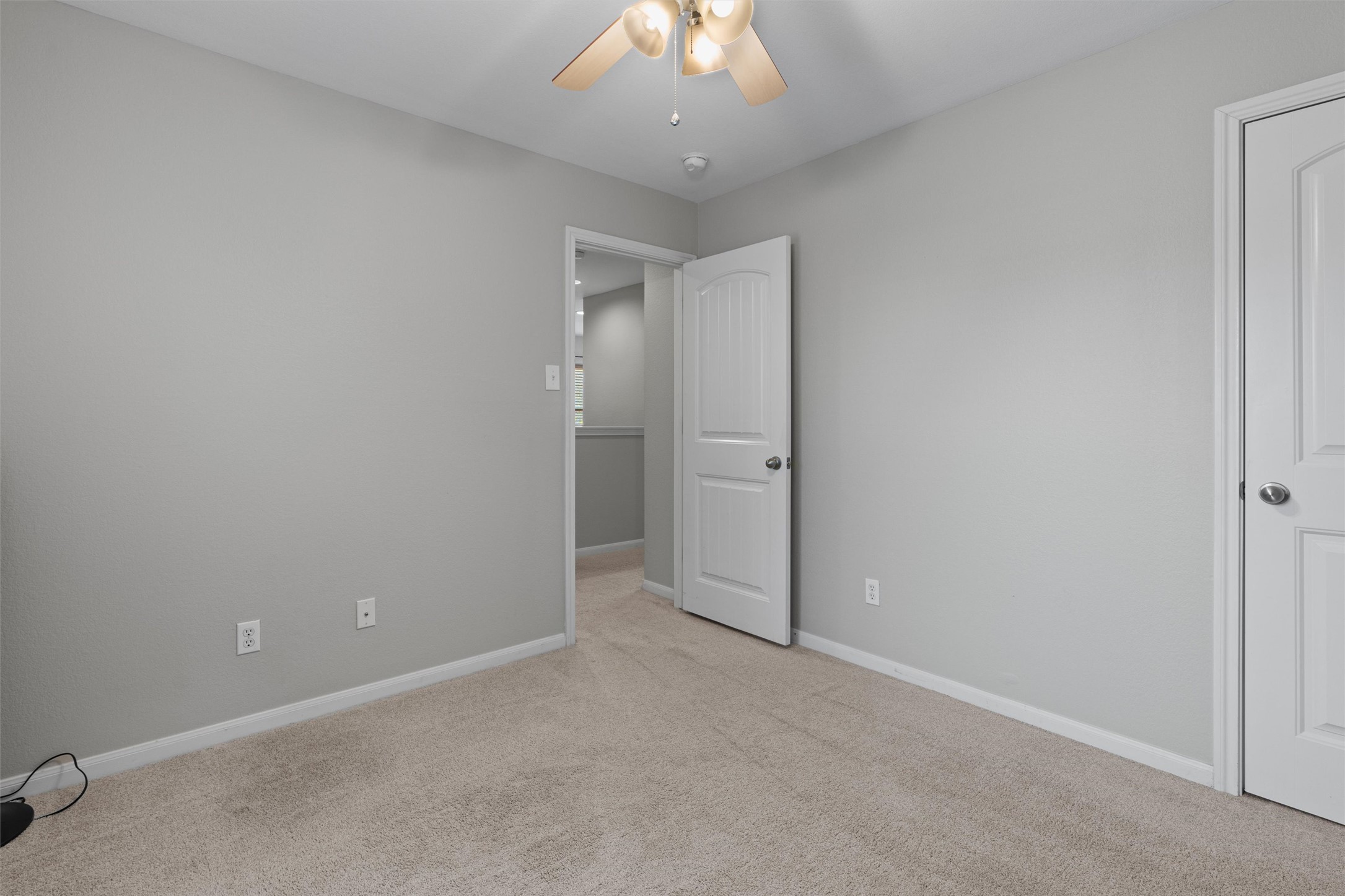 2240 Independence Drive, Unit A83 Austin, TX 78745 - Photo 26 of 34 an empty room with a bathroom