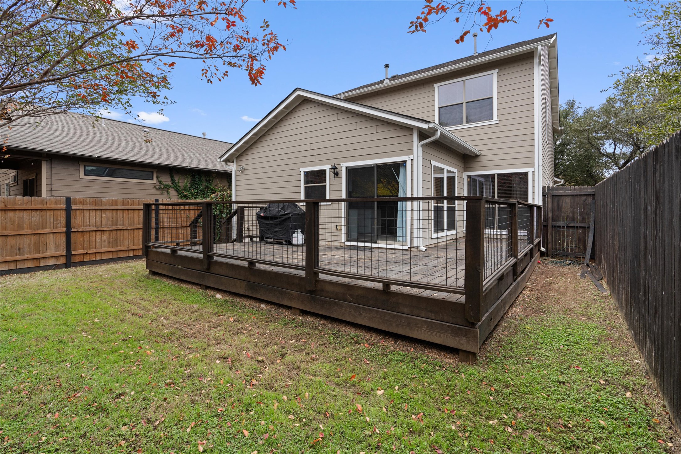 2240 Independence Drive, Unit A83 Austin, TX 78745 - Photo 32 of 34 a view of a small house with wooden fence