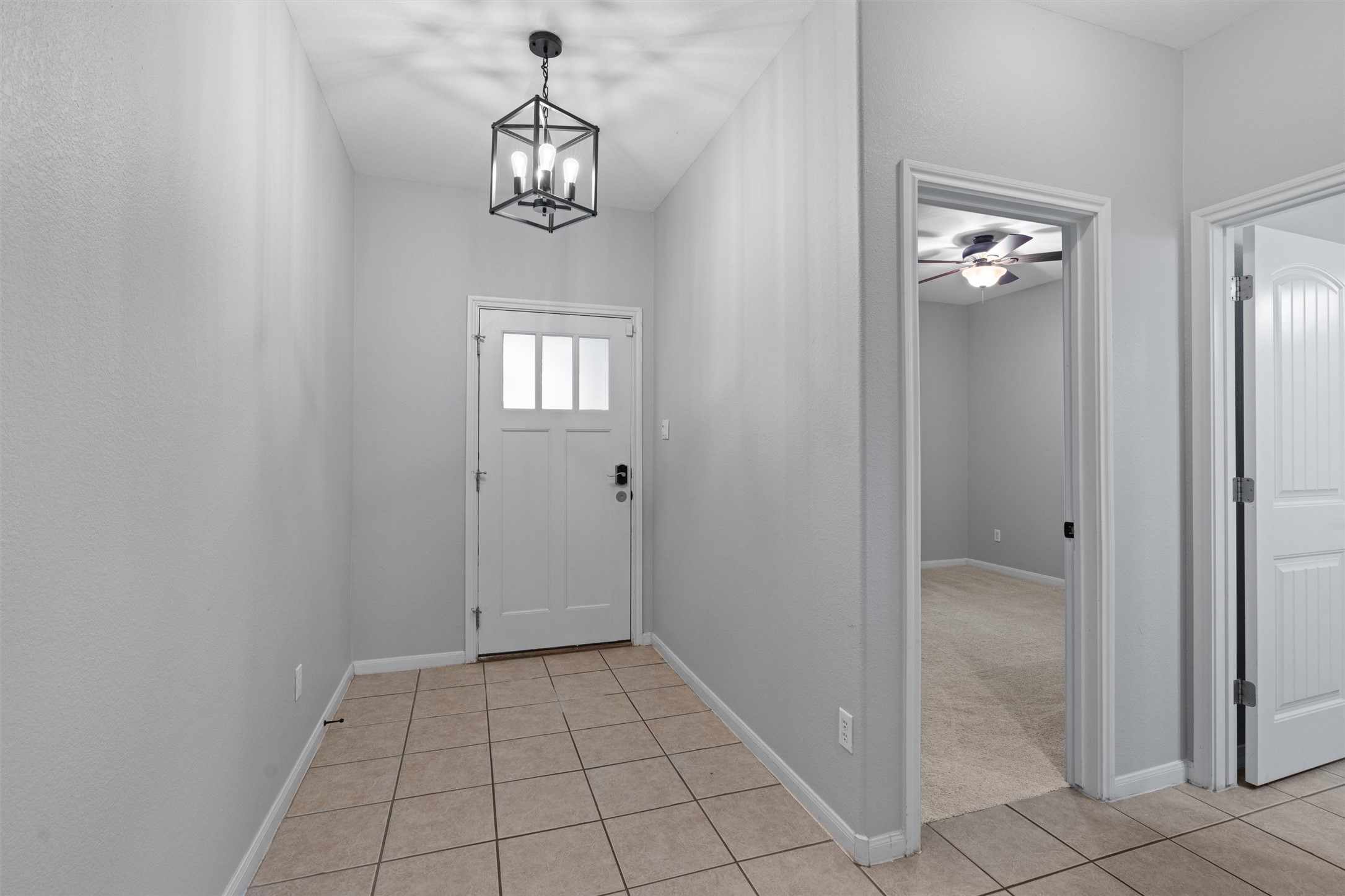 2240 Independence Drive, Unit A83 Austin, TX 78745 - Photo 4 of 34 a view of an hallway with wooden floor