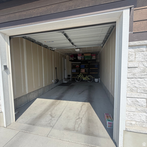 3047 Old Emigrant Road, Unit C Syracuse, UT 84075 - Photo 21 of 24 Large 1 car garage with lots of overhead storage