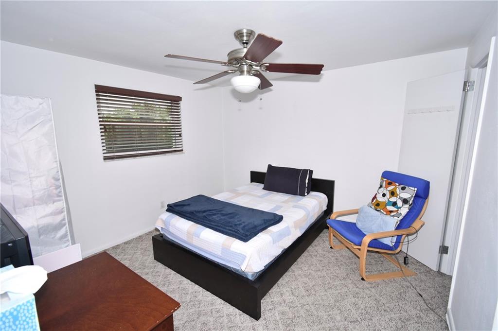 435 Elmer Street Edgewood, PA 15218 - Photo 11 of 16 a living room with furniture and a rug