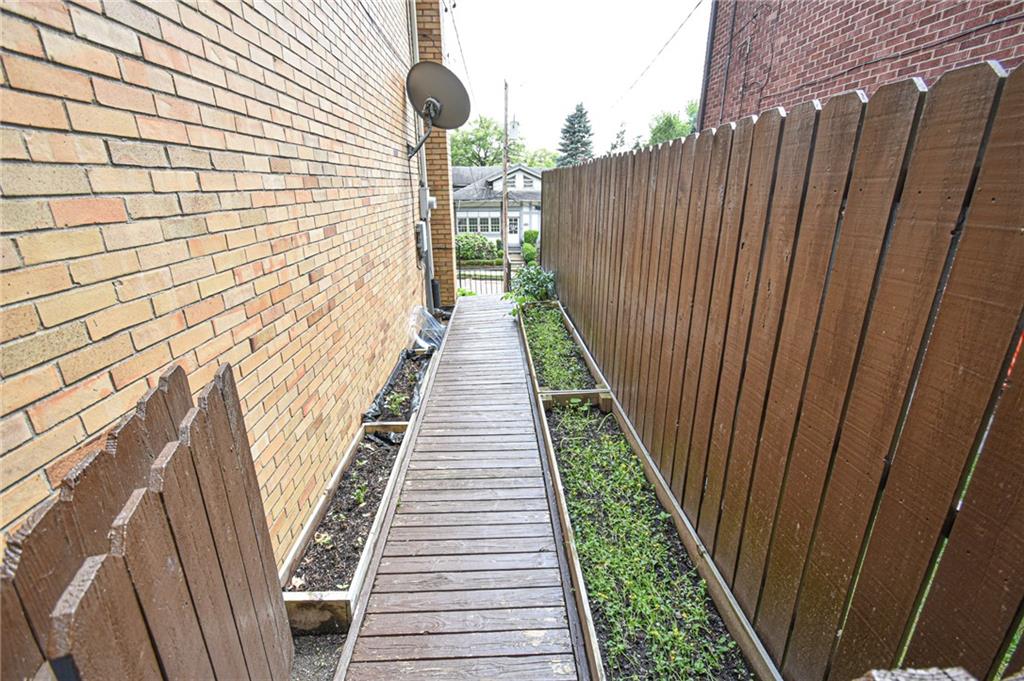 435 Elmer Street Edgewood, PA 15218 - Photo 14 of 16 a view of balcony with wooden floor
