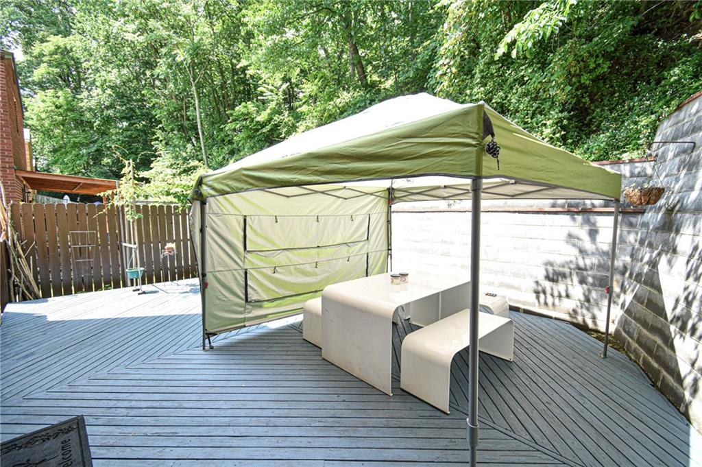 435 Elmer Street Edgewood, PA 15218 - Photo 15 of 16 a view of balcony with wooden floor and outdoor seating