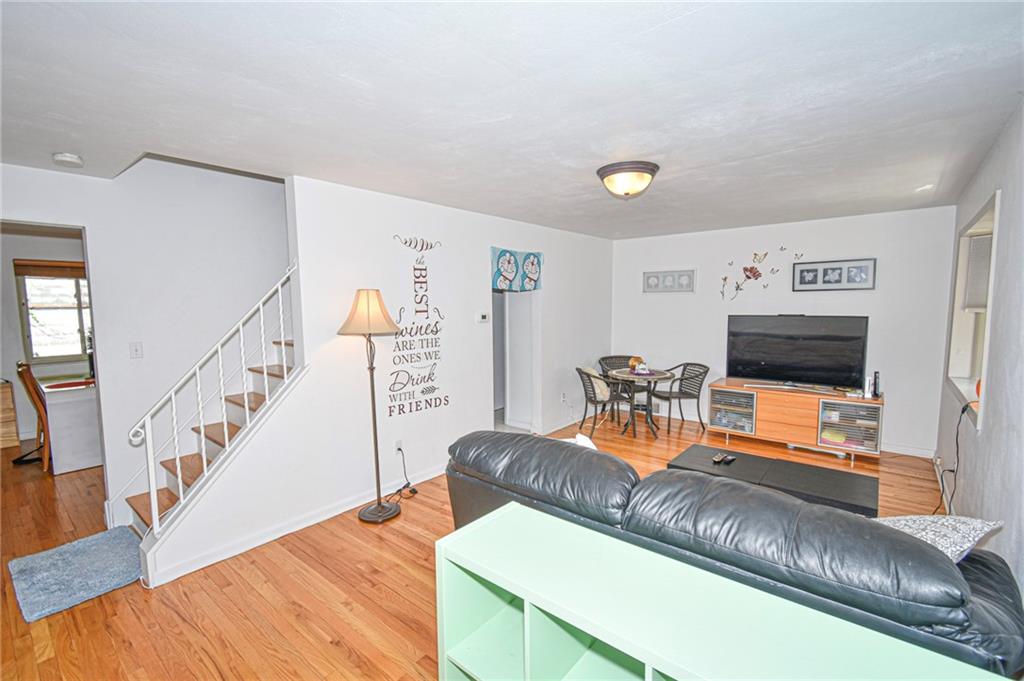435 Elmer Street Edgewood, PA 15218 - Photo 2 of 16 a living room with furniture and a flat screen tv