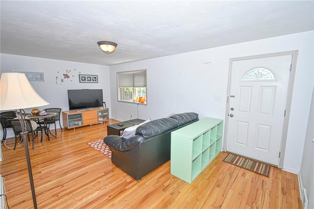 435 Elmer Street Edgewood, PA 15218 - Photo 3 of 16 a living room with furniture and a flat screen tv