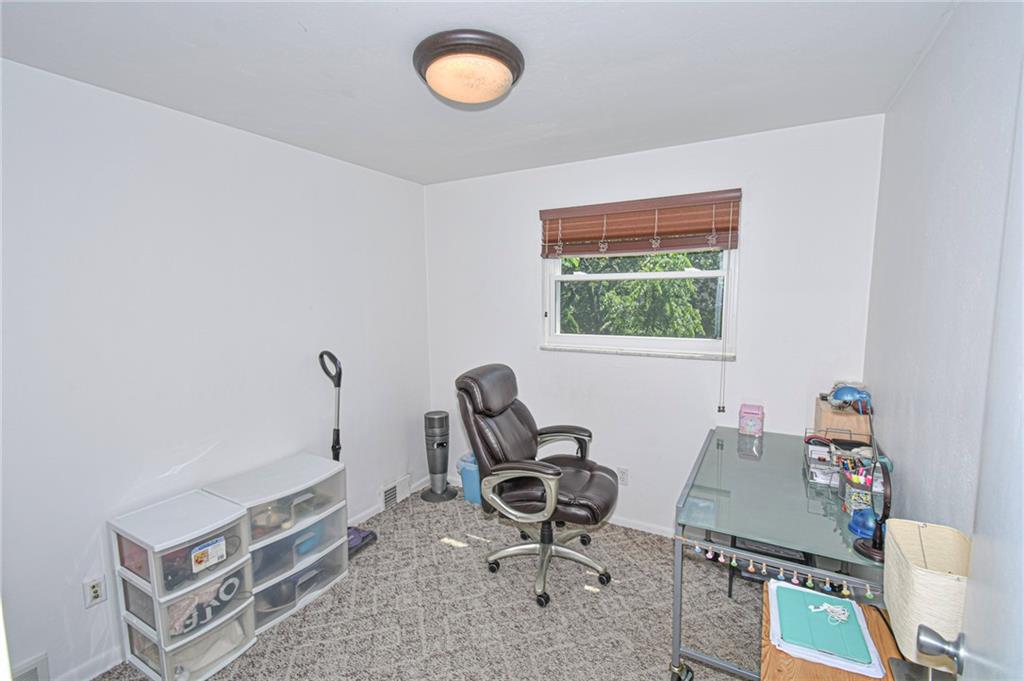 435 Elmer Street Edgewood, PA 15218 - Photo 10 of 16 a room with furniture and a window