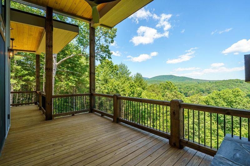 216 Old Orchard Road Ellijay, GA 30536 - Photo 30 of 59 a view of a balcony with wooden floor