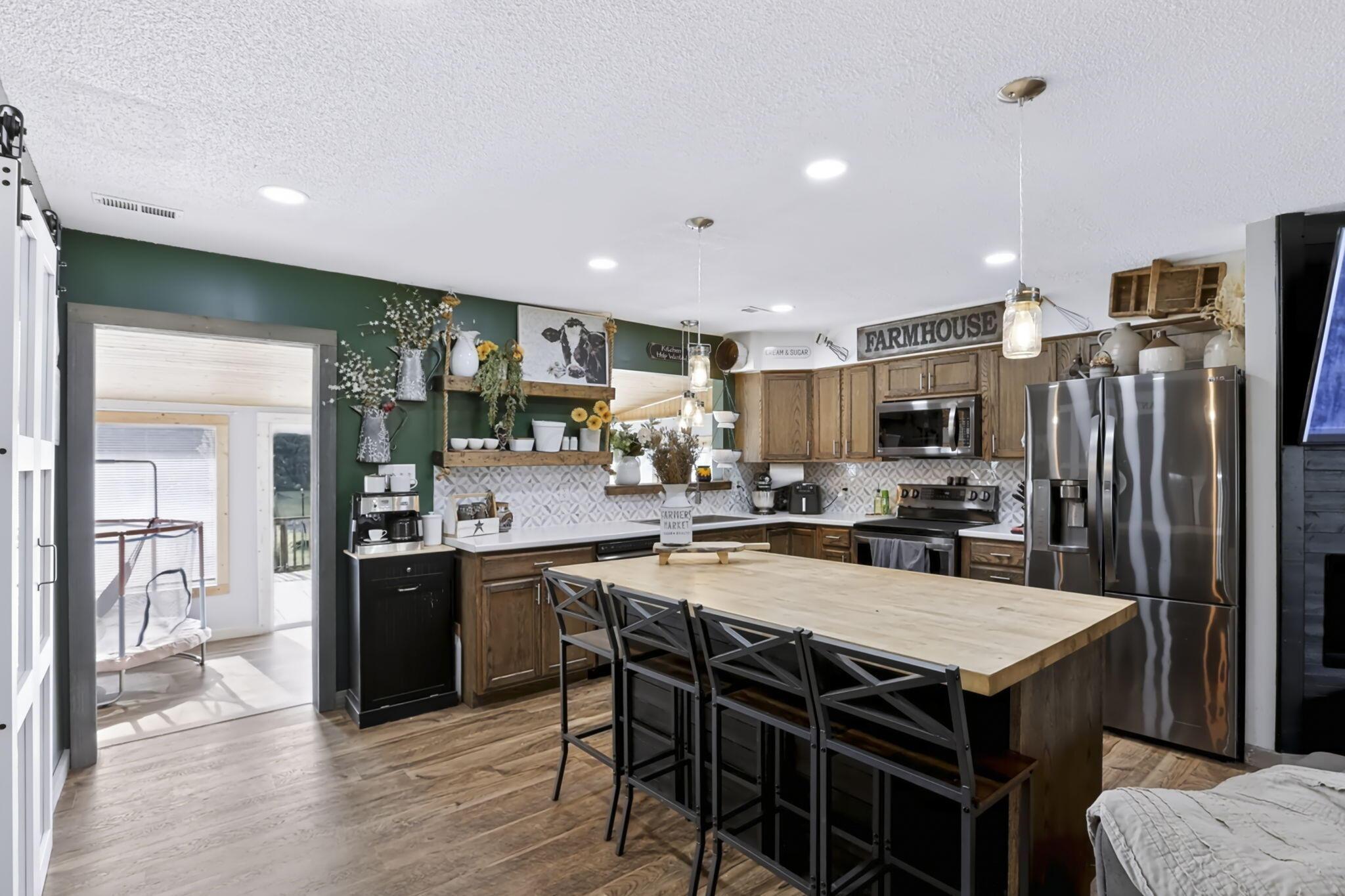 2403 Hickman Road Northeast Newark, OH 43055 - Photo 10 of 62 Farmhouse Kitchen w/ Island