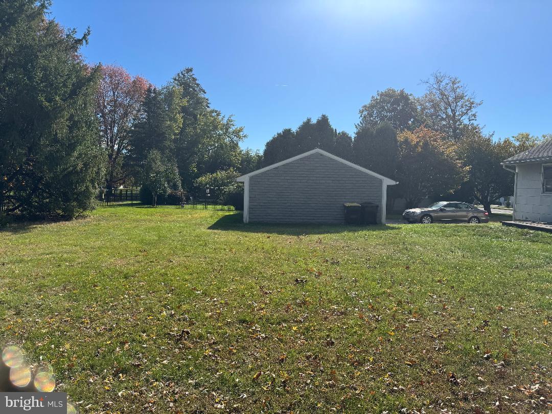 1533 School Road Hatfield, PA 19440 - Photo 6 of 13 a big house with a big yard and large trees