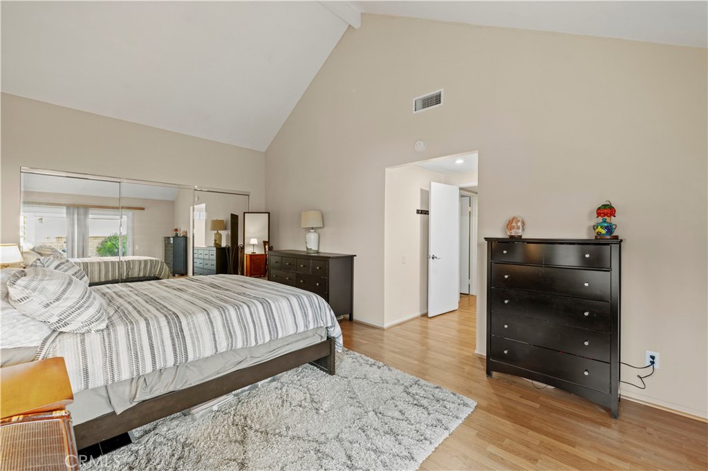 23716 Rotunda Road Valencia, CA 91355 - Photo 20 of 39 a bedroom with a bed and a dresser