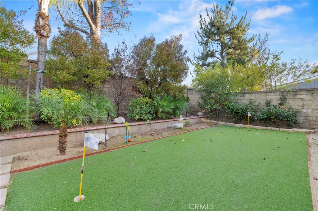 23716 Rotunda Road Valencia, CA 91355 - Photo 37 of 39 a view of a green field with wooden fence
