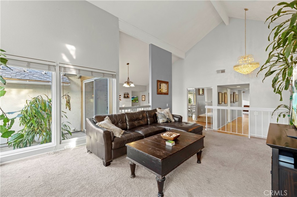 23716 Rotunda Road Valencia, CA 91355 - Photo 5 of 39 a living room with furniture and a large window