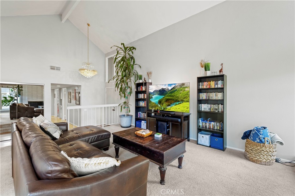 23716 Rotunda Road Valencia, CA 91355 - Photo 9 of 39 a living room with furniture and a potted plant