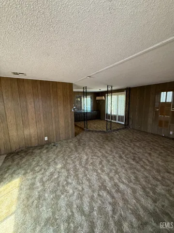 a view of a backyard of the house