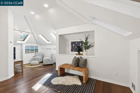 a view of livingroom with furniture and wooden floor