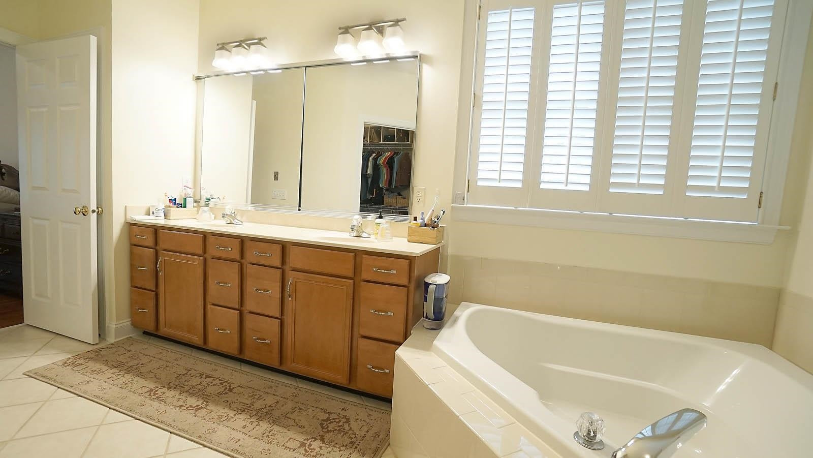 10217 Sporting Club Drive Raleigh, NC 27617 - Photo 27 of 45 Master Bathroom has access to closet and separate toilet room with a bidet. Master Bath