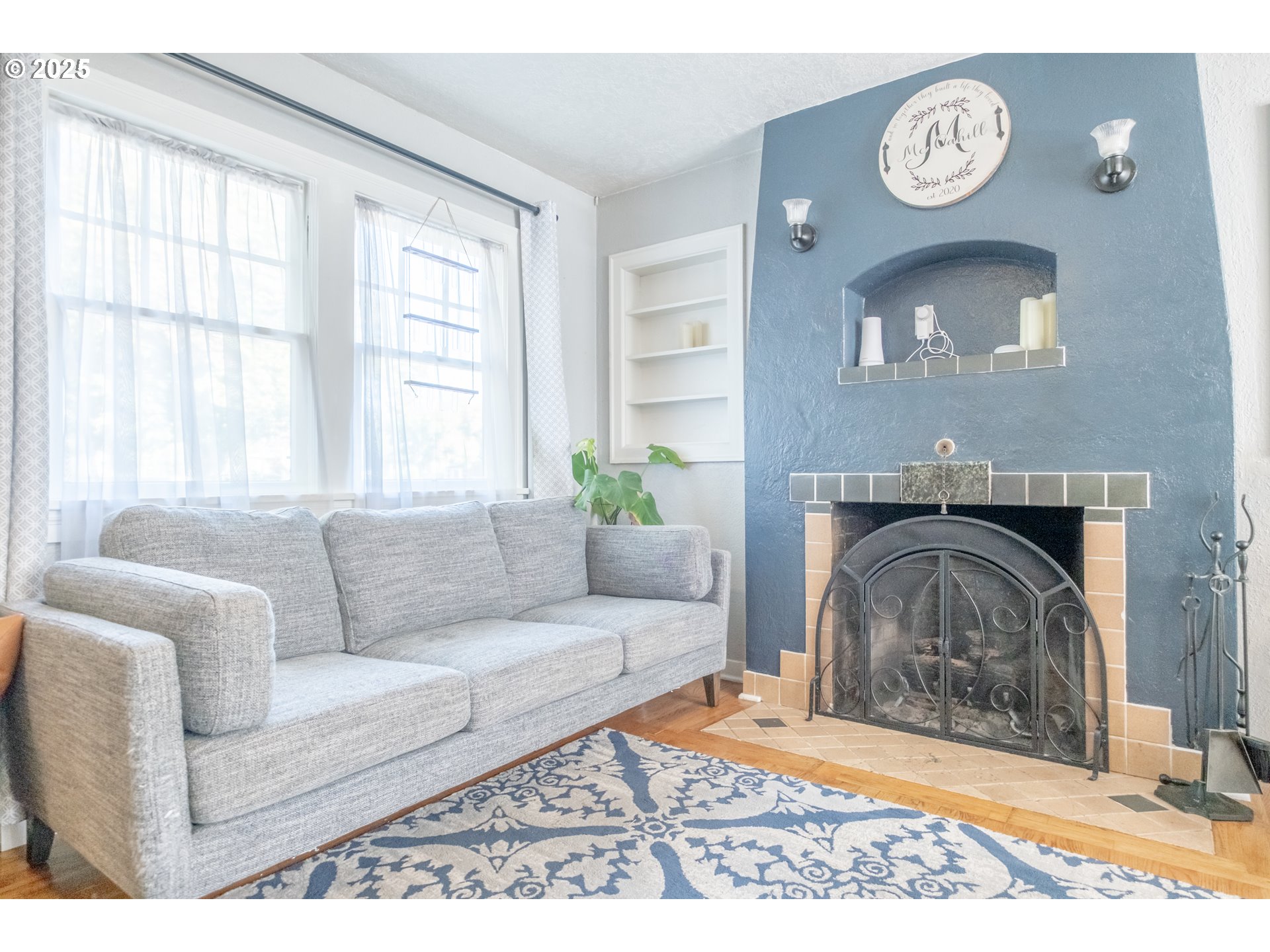 906 Southwest 11th Avenue Albany, OR 97321 - Photo 11 of 48 a living room with furniture and a fireplace