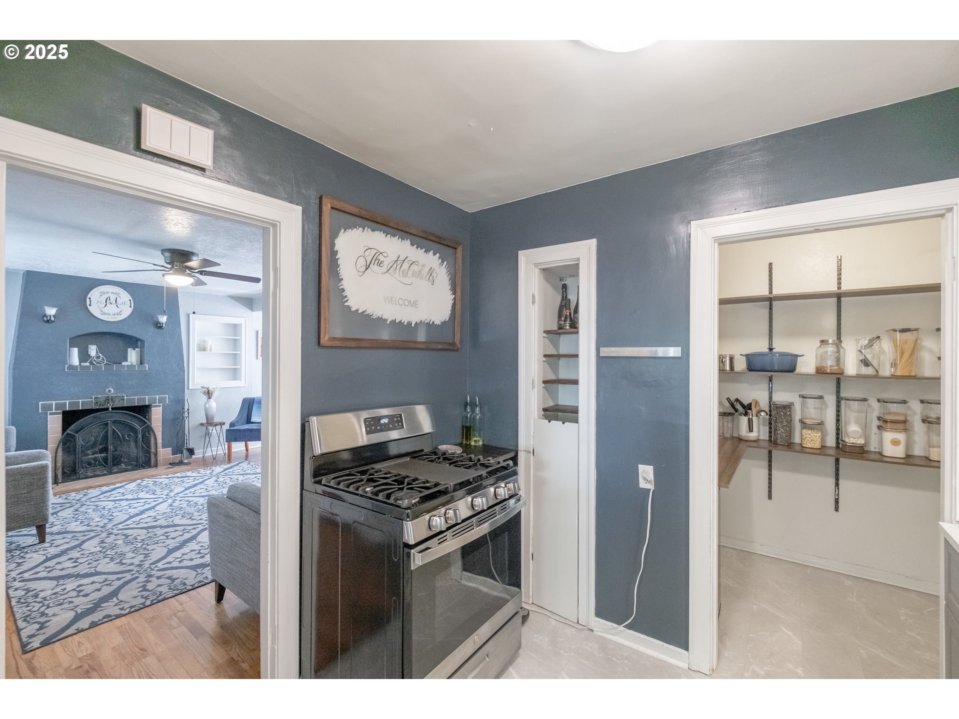 906 Southwest 11th Avenue Albany, OR 97321 - Photo 15 of 48 a kitchen view with cabinets a stove and a refrigerator