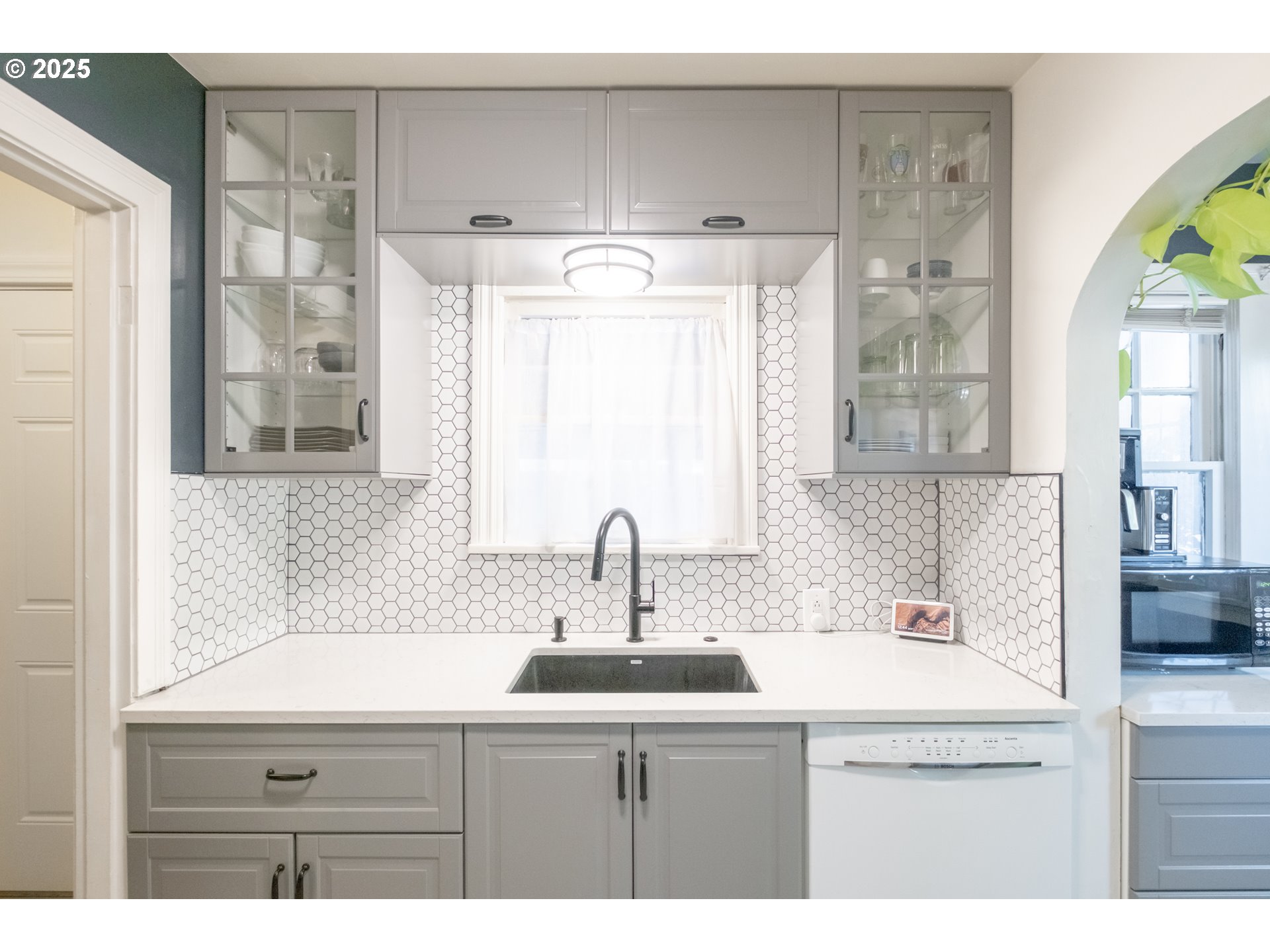 906 Southwest 11th Avenue Albany, OR 97321 - Photo 21 of 48 a kitchen with a sink and cabinets