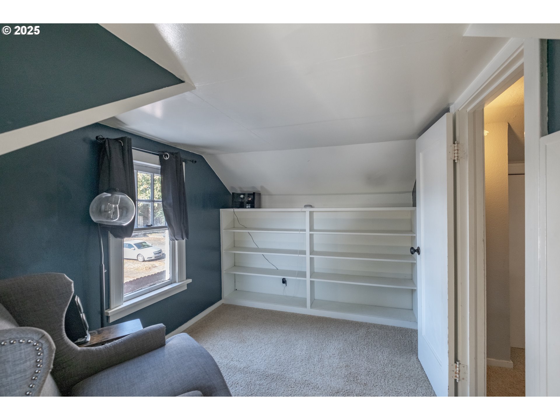 906 Southwest 11th Avenue Albany, OR 97321 - Photo 36 of 48 a bedroom with a bed and a window