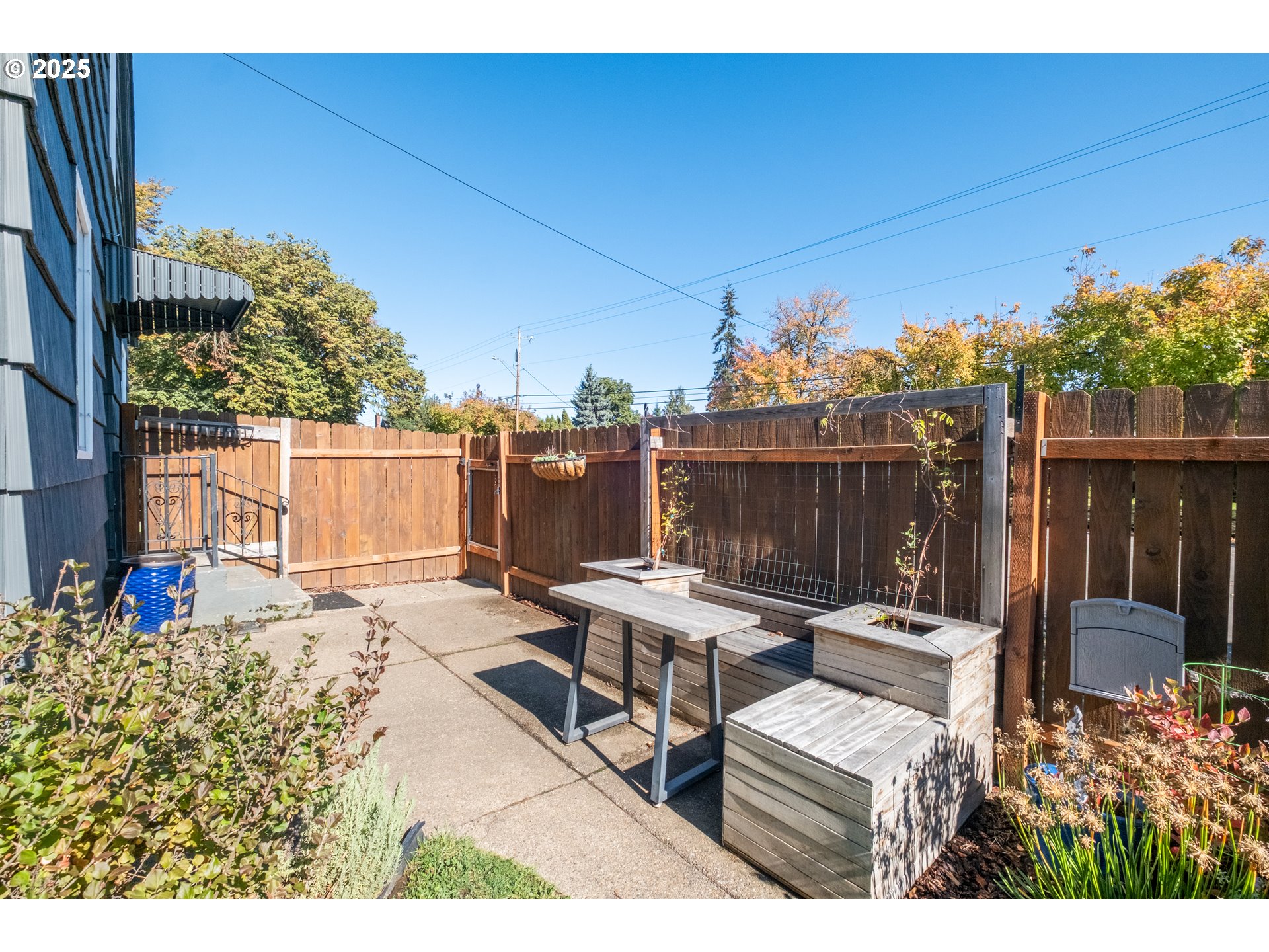 906 Southwest 11th Avenue Albany, OR 97321 - Photo 44 of 48 a view of a patio with table and chairs and potted plants