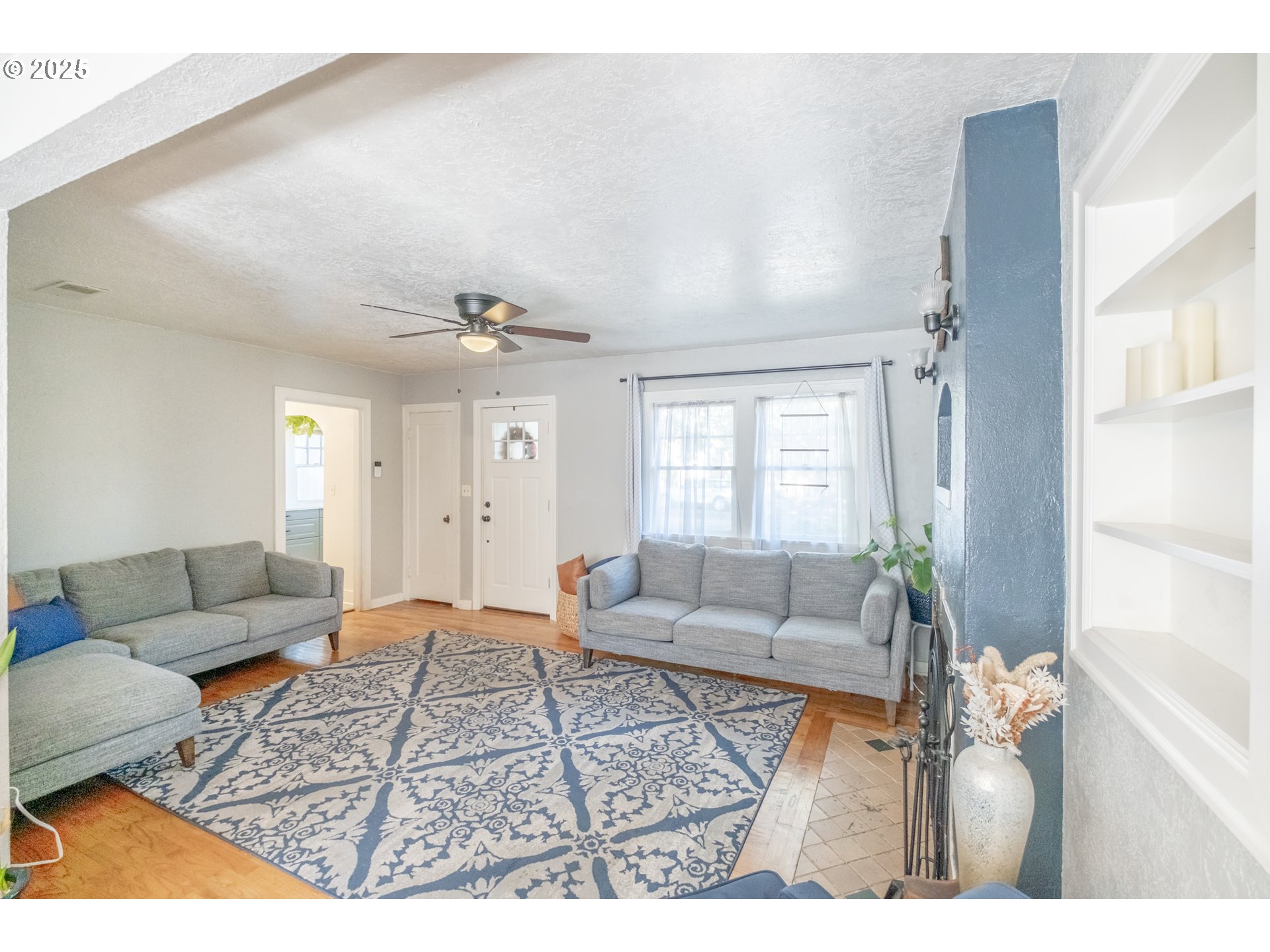 906 Southwest 11th Avenue Albany, OR 97321 - Photo 10 of 48 a living room with furniture and a rug