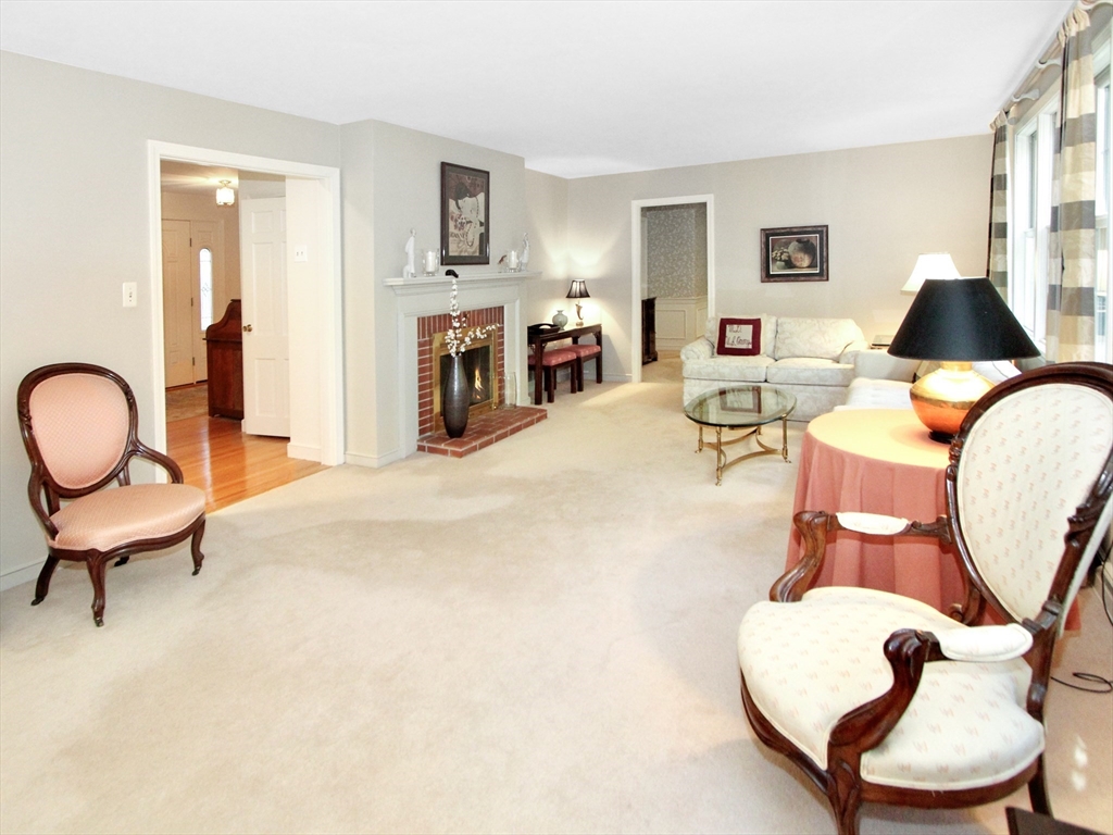 33 Pine Arden Drive West Boylston, MA 01583 - Photo 11 of 32 a living room with furniture a flat screen tv and dresser