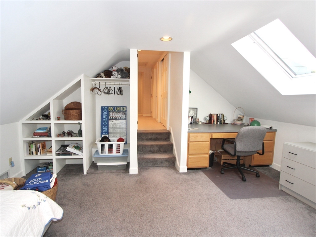 33 Pine Arden Drive West Boylston, MA 01583 - Photo 20 of 32 a view of a bedroom with baby crib and cabinet