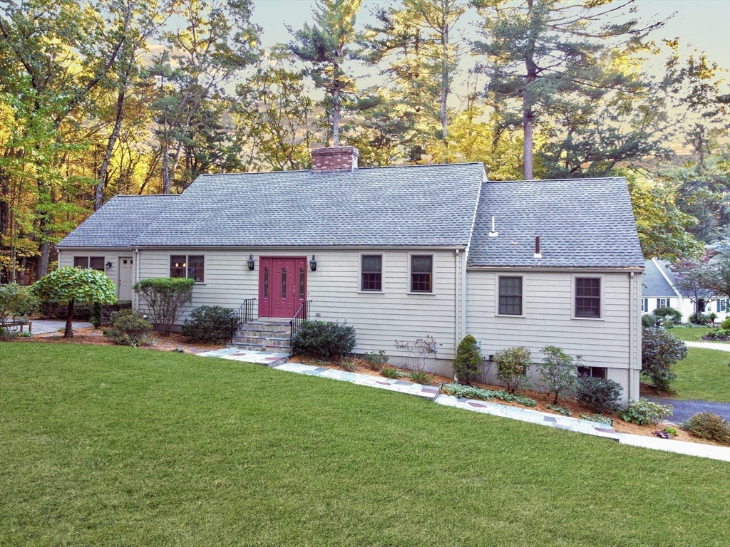 33 Pine Arden Drive West Boylston, MA 01583 - Photo 2 of 32 a front view of a house with a garden