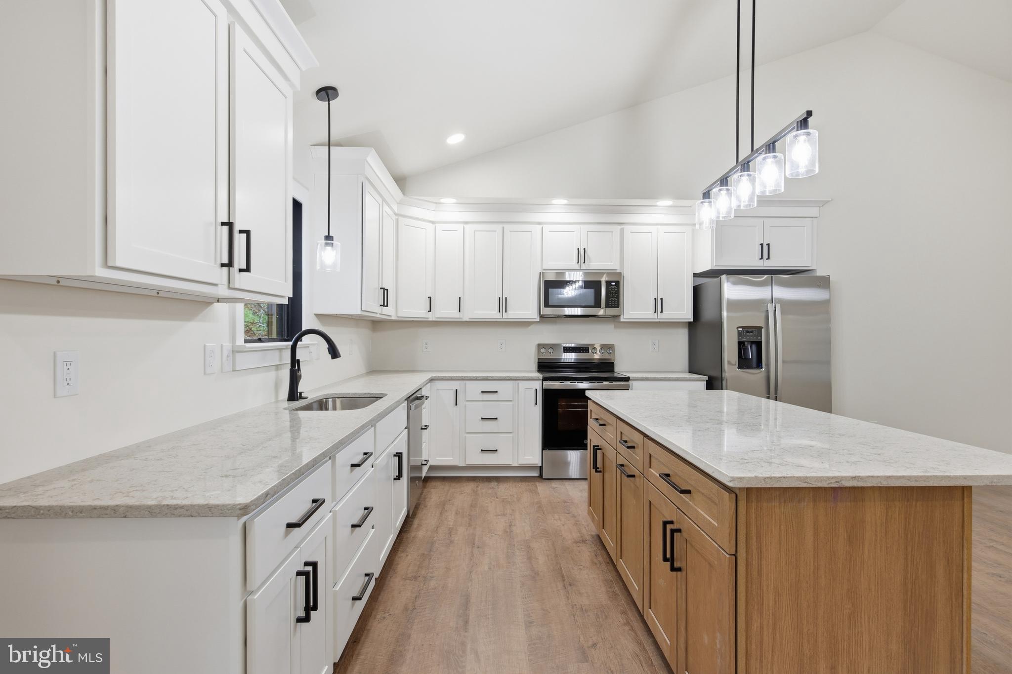125 Crabapple Road Mount Jackson, VA 22842 - Photo 12 of 51 a kitchen with granite countertop a sink stove and refrigerator
