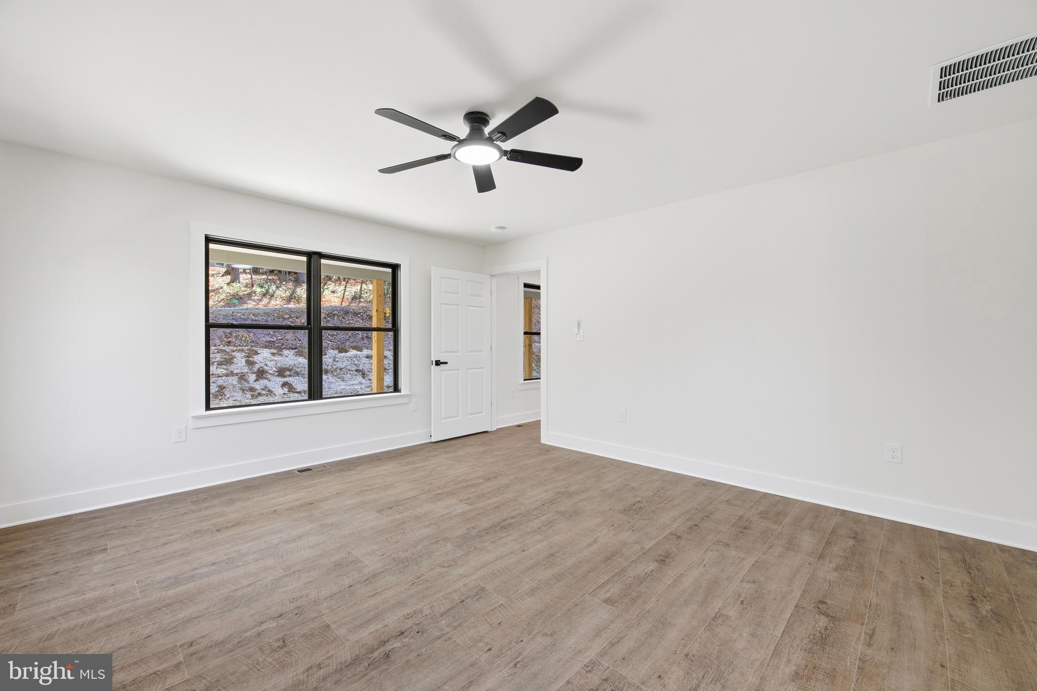 125 Crabapple Road Mount Jackson, VA 22842 - Photo 20 of 51 a view of an empty room with a window