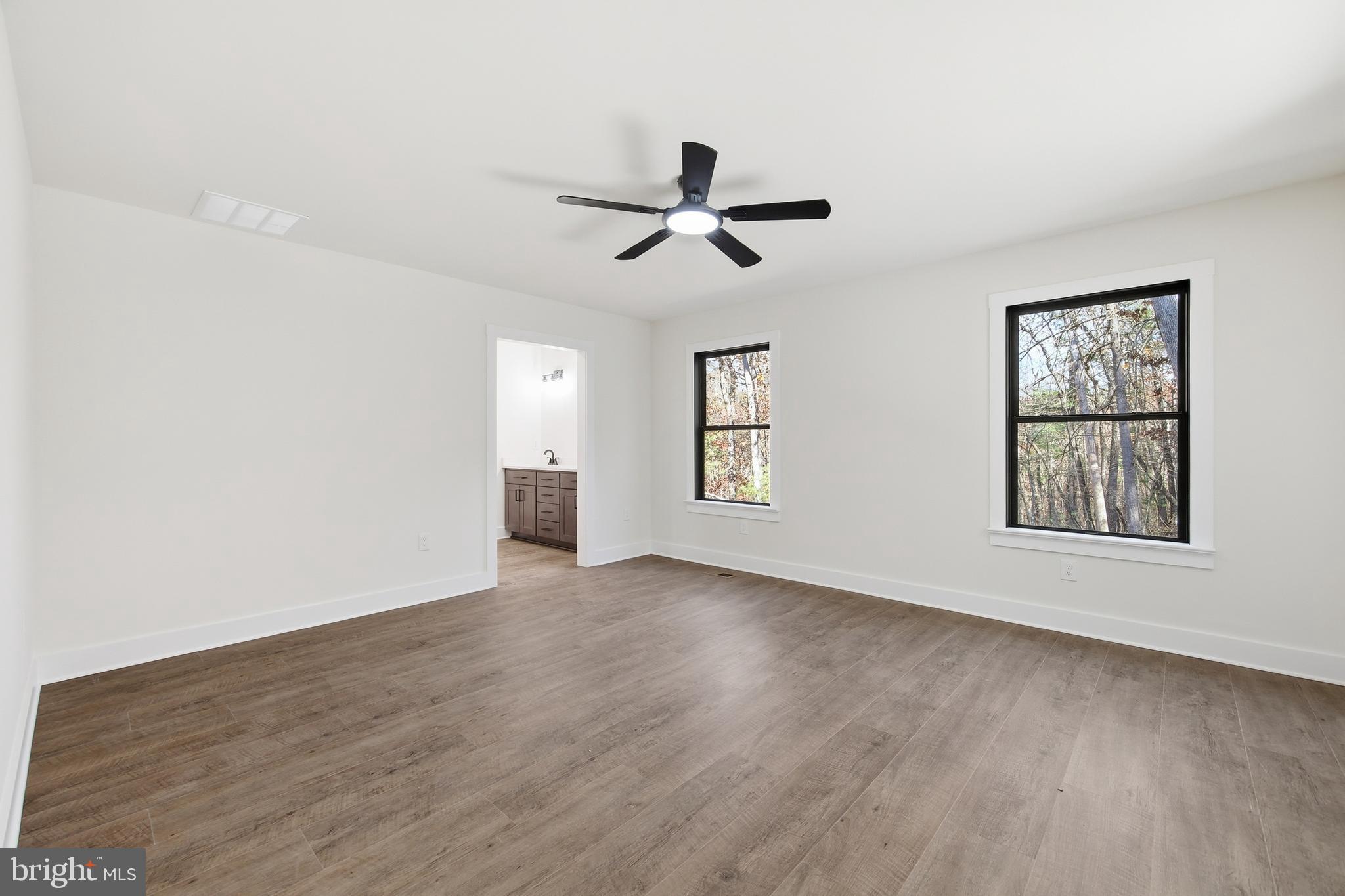 125 Crabapple Road Mount Jackson, VA 22842 - Photo 21 of 51 wooden floor in an empty room with a window
