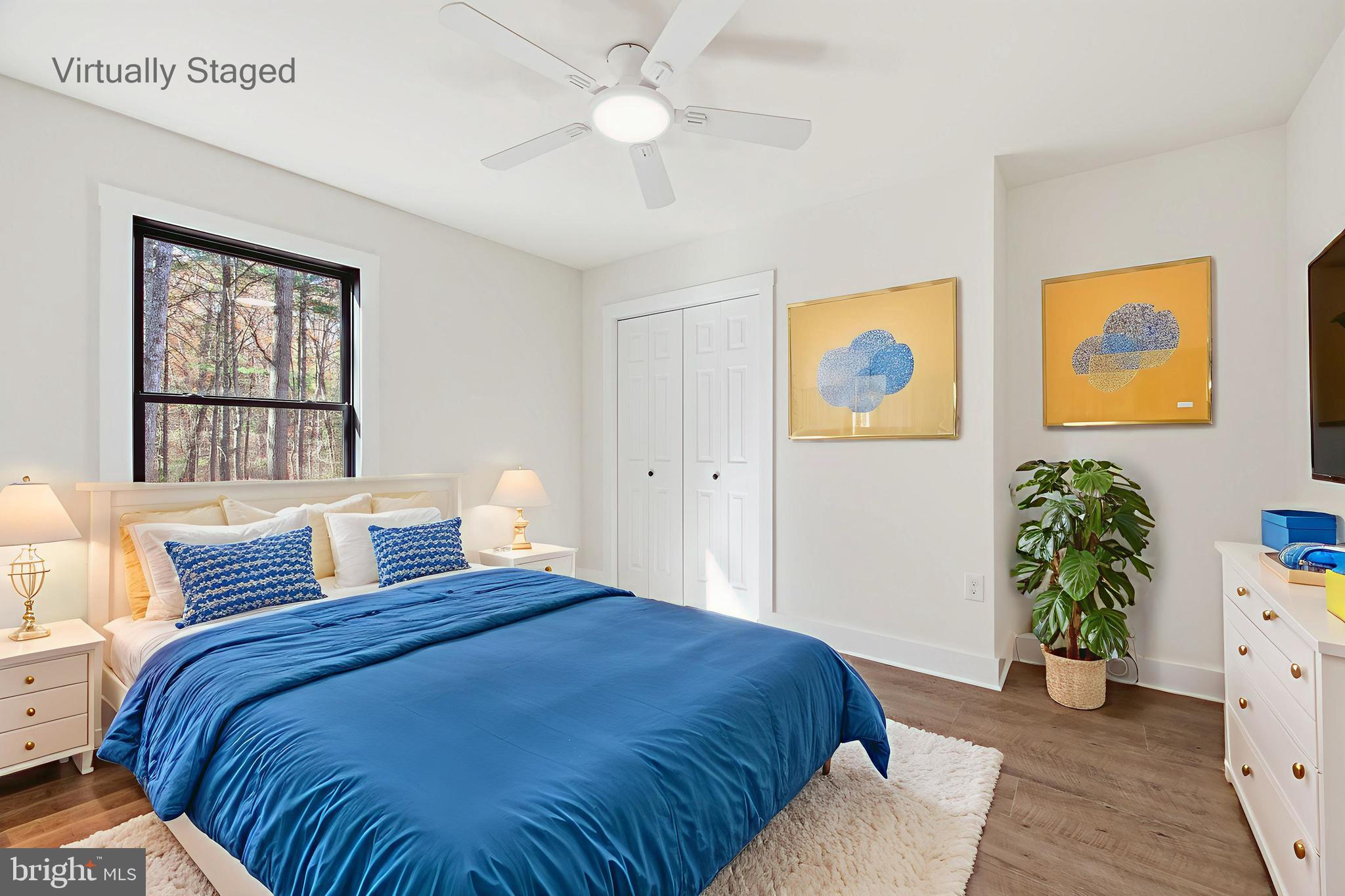 125 Crabapple Road Mount Jackson, VA 22842 - Photo 30 of 51 a bedroom with a bed and a painting on the wall