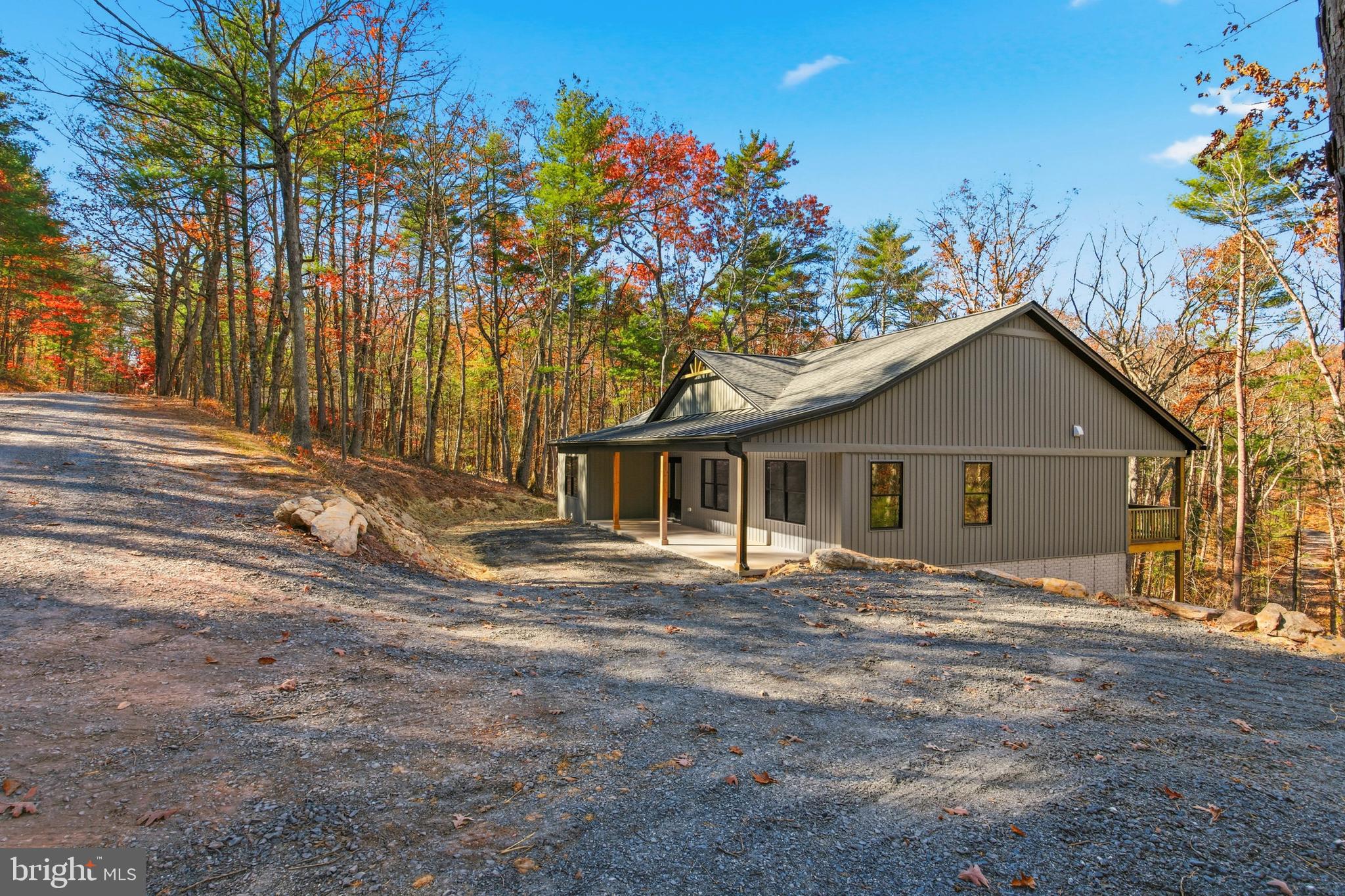 125 Crabapple Road Mount Jackson, VA 22842 - Photo 3 of 51 a house with trees in the background