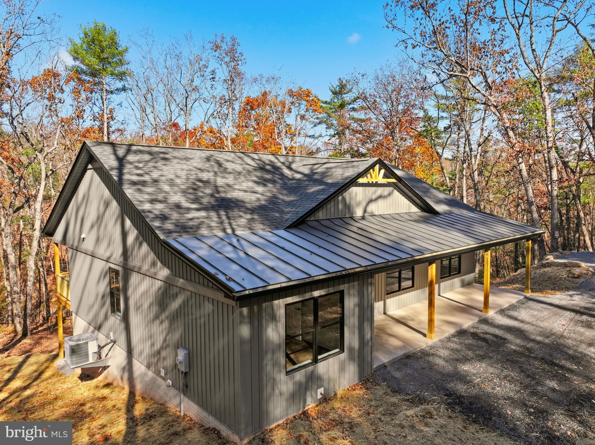 125 Crabapple Road Mount Jackson, VA 22842 - Photo 42 of 51 a roof deck with table and chairs and potted plants