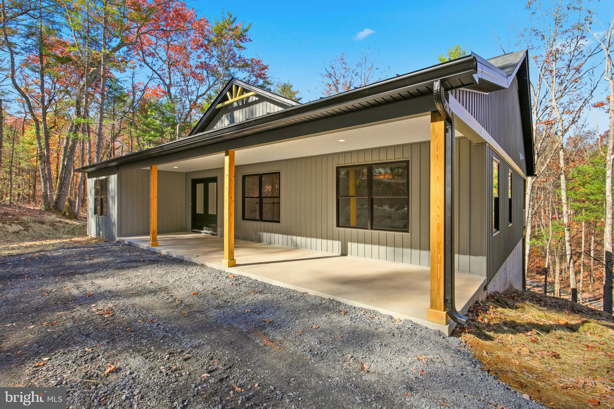 125 Crabapple Road Mount Jackson, VA 22842 - Photo 43 of 51 a view of a house with a large tree and wooden fence