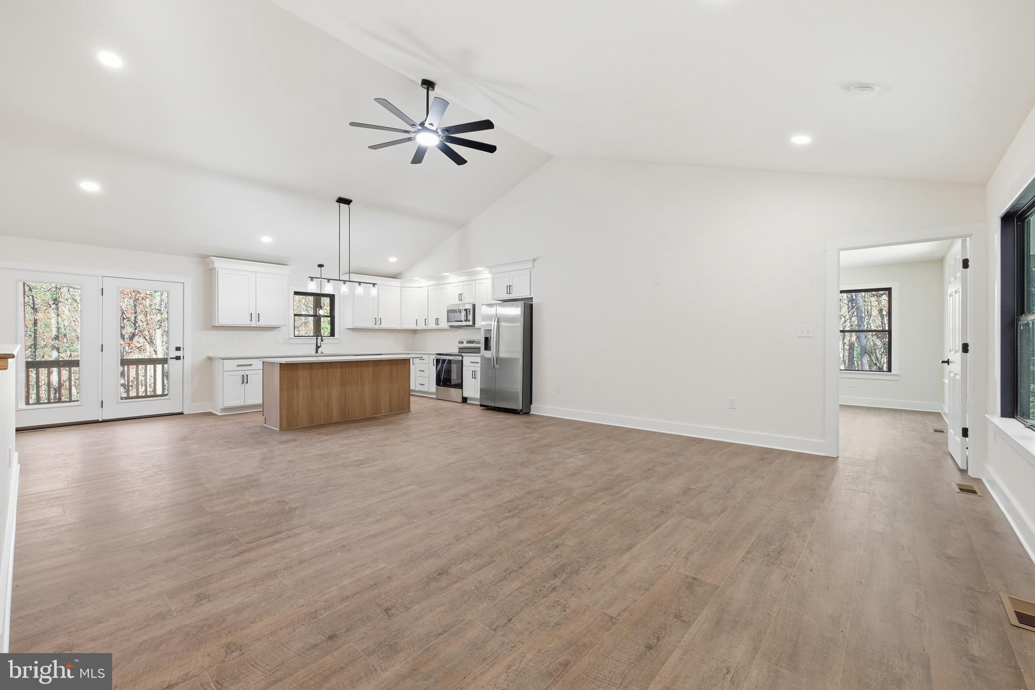 125 Crabapple Road Mount Jackson, VA 22842 - Photo 5 of 51 a view of a kitchen with a sink and a stove top oven