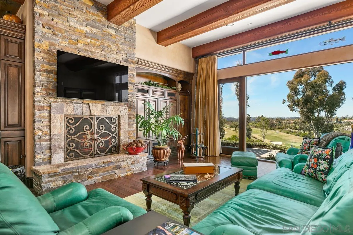 6934 St Andrews Road Rancho Santa Fe, CA 92067 - Photo 14 of 49 a outdoor living space with furniture and a flat screen tv