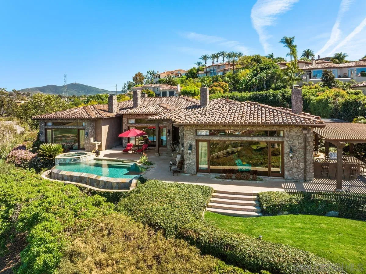 6934 St Andrews Road Rancho Santa Fe, CA 92067 - Photo 2 of 49 a front view of house with yard