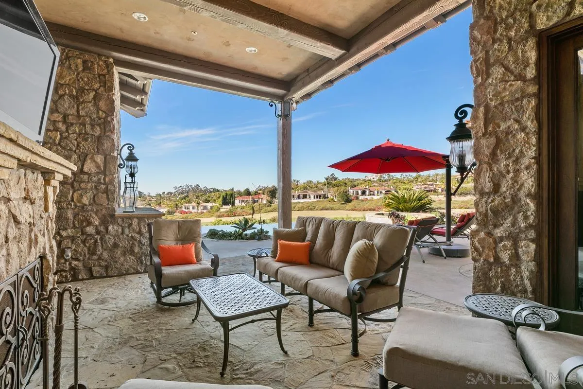 6934 St Andrews Road Rancho Santa Fe, CA 92067 - Photo 35 of 49 a outdoor living space with furniture and a potted plant