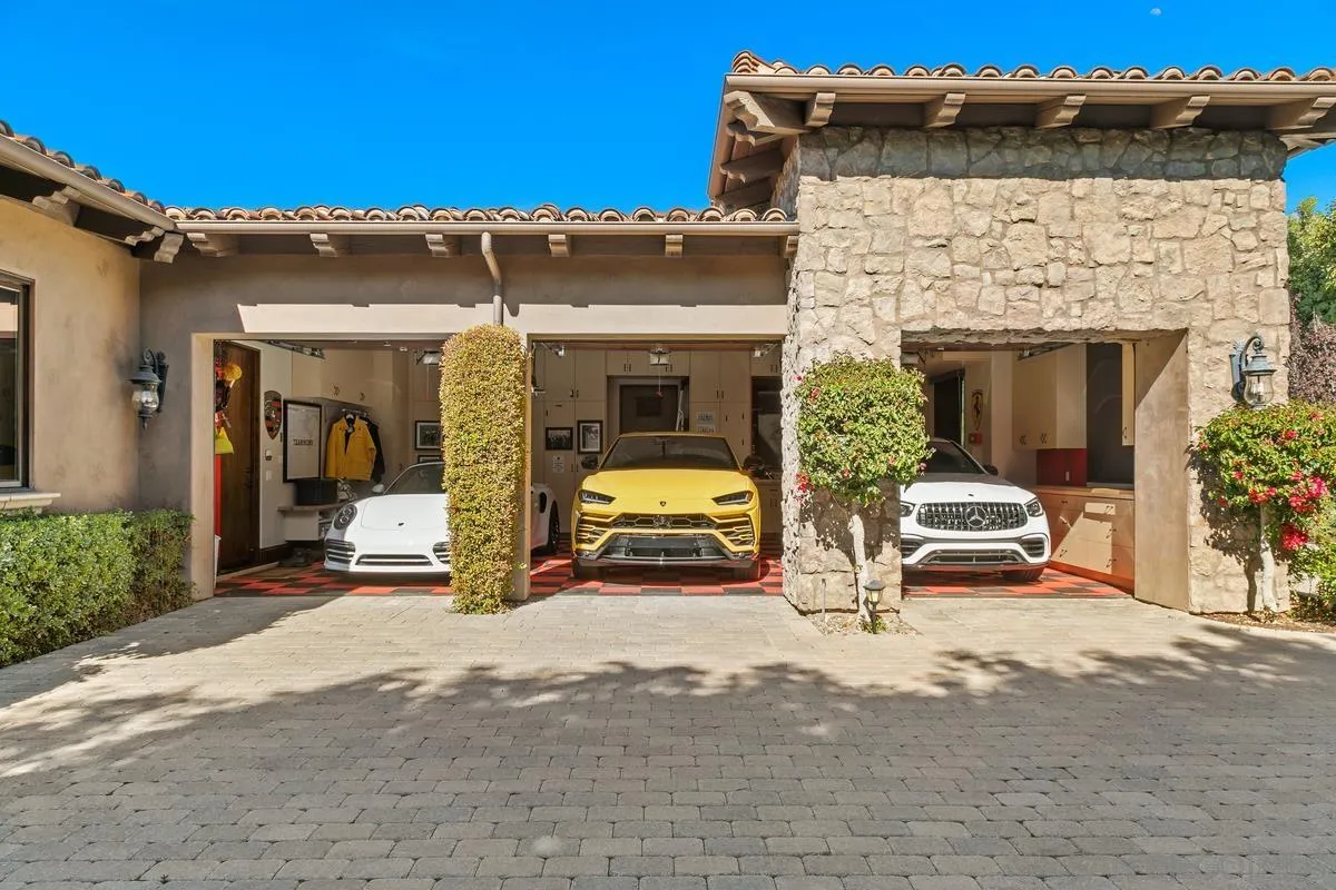 6934 St Andrews Road Rancho Santa Fe, CA 92067 - Photo 43 of 49 a view of car parked in front of house
