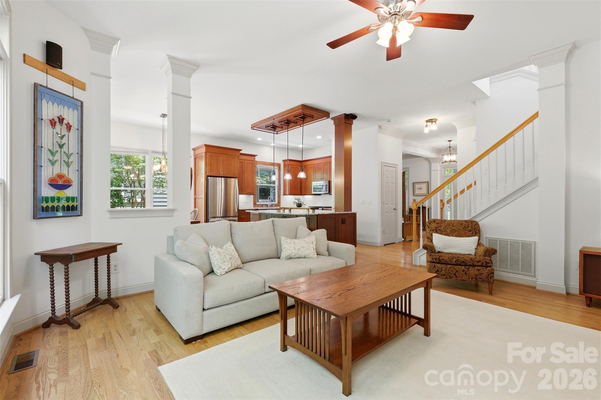 739 Julia Street Fort Mill, SC 29708 - Photo 12 of 48 a living room with furniture and a wooden floor