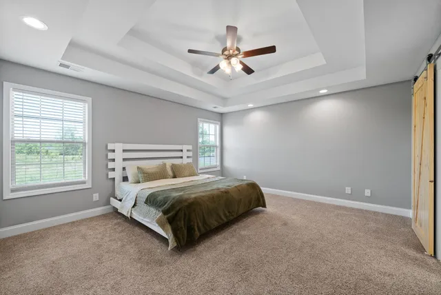 a white bath tub sitting next to a white sink