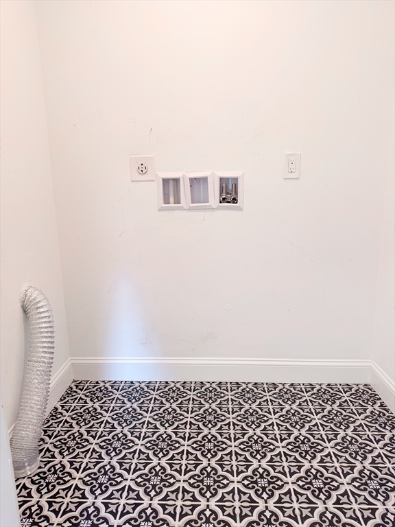 41 Pond Street, Unit 1 Framingham, MA 01702 - Photo 12 of 15 a close up of a wall