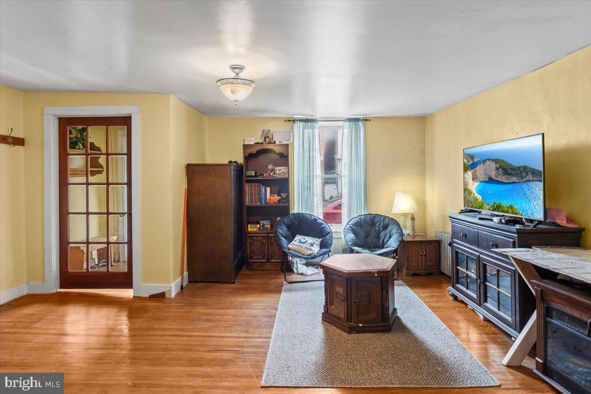 217 Market Street Halifax, PA 17032 - Photo 14 of 35 a living room with furniture and a flat screen tv
