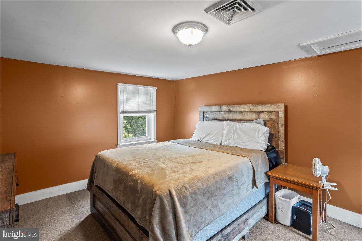 217 Market Street Halifax, PA 17032 - Photo 26 of 35 a bedroom with a bed and a window