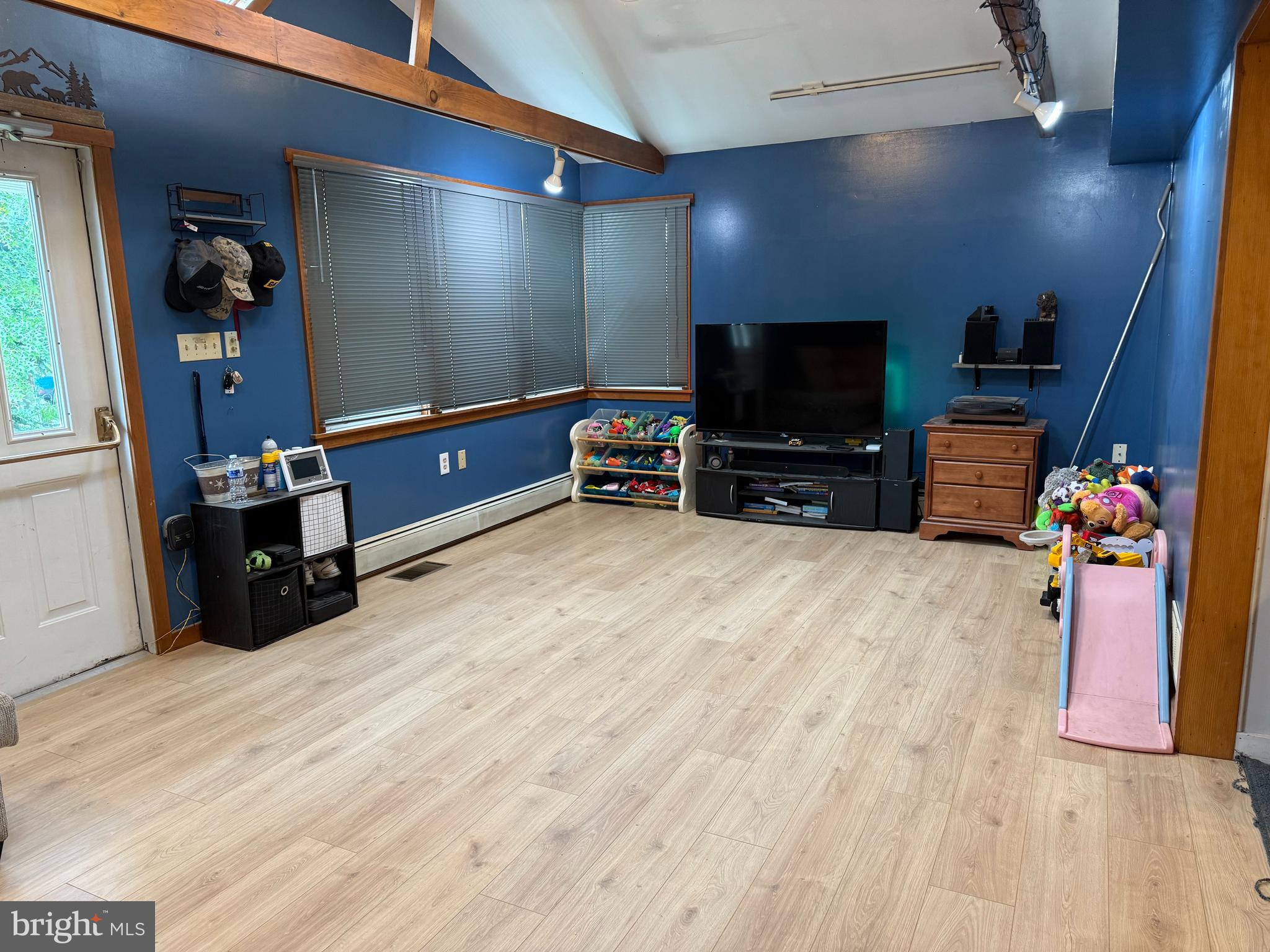 217 Market Street Halifax, PA 17032 - Photo 6 of 35 a room with furniture and a flat screen tv