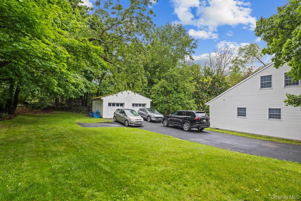 289 Seven Springs Mountain Road Monroe, NY 10950 - Photo 22 of 25 a view of a house with a yard and sitting area