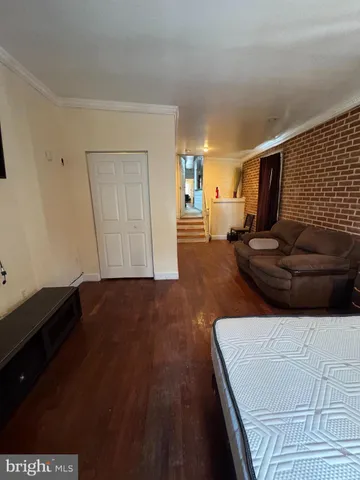 a bathroom with a toilet a sink and a mirror